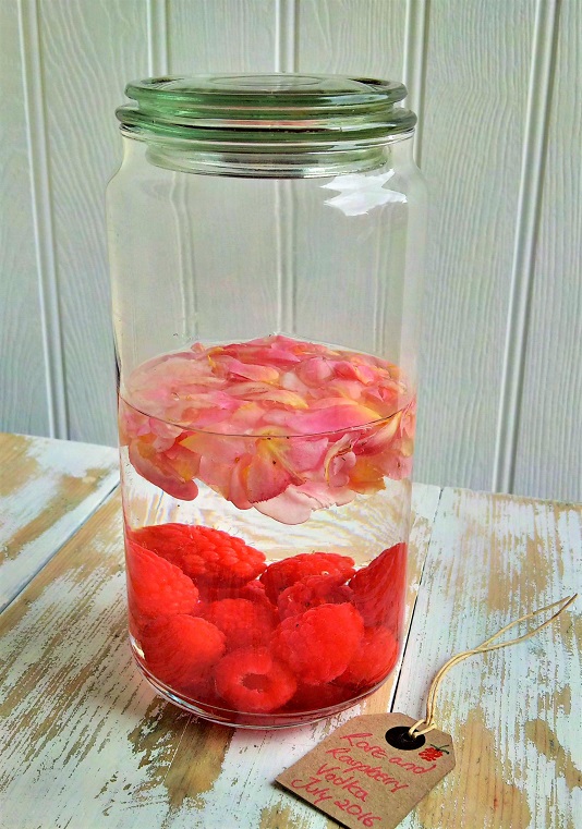 Rose_and_raspberry_vodka_in_preserving_jar