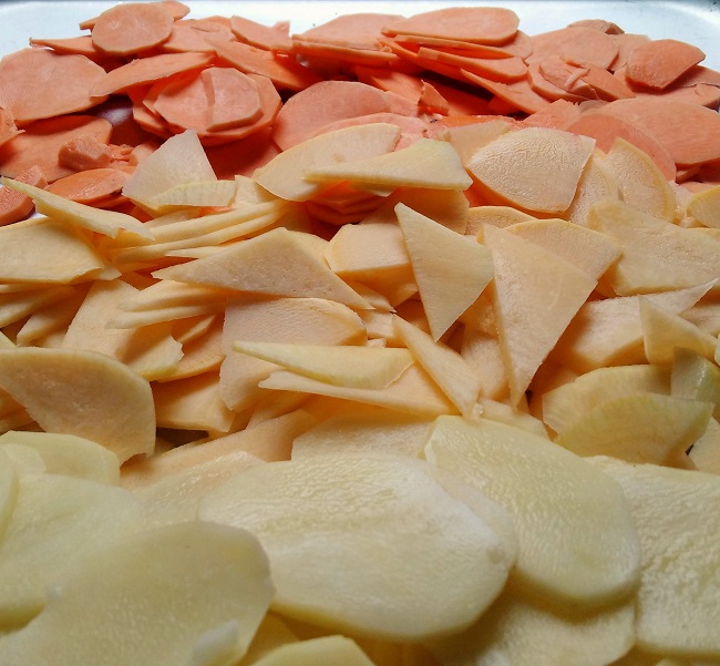 Tray_of_thinly_sliced_sweet_potato_turnip_and_potato