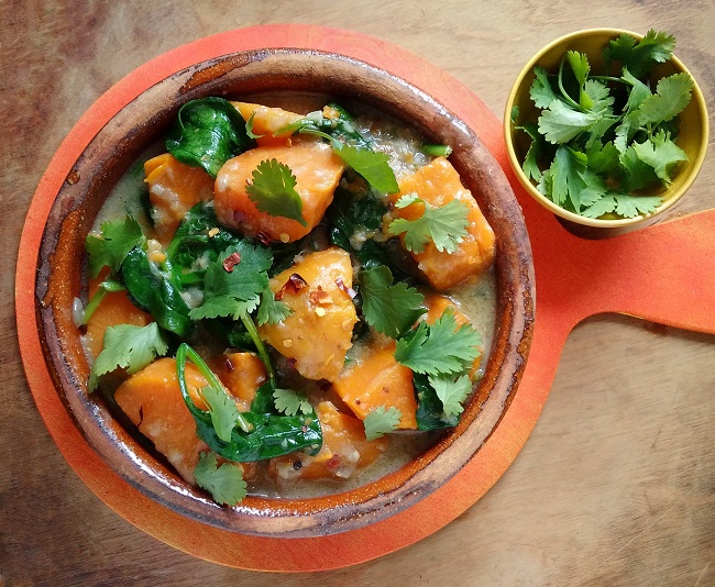 Serving_bowl_of_sweet_potato_coconut_and_spinach_stew