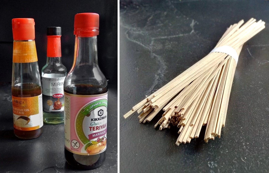 Bottles_pf_sesame_oil_mirin_andTeriyaki marinade_with_a_bunch_of_soba_noodles