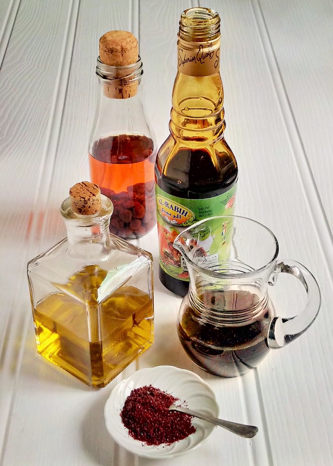 Strawberry_vinegar_olive_oil_pomegranate_molasses_and sumac_powder