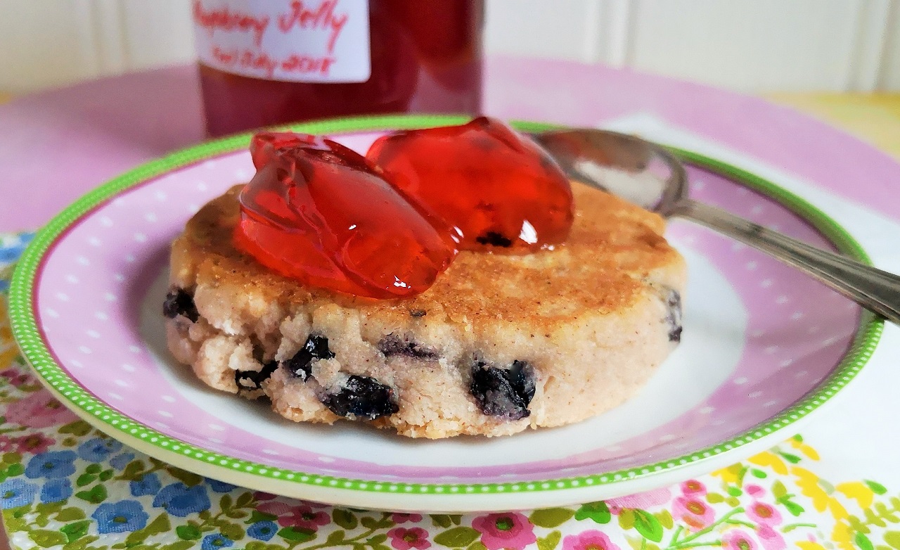 2_spoonfuls_of_rhubarb_and_raspberry_jelly_served_on_a_Welsh_cake