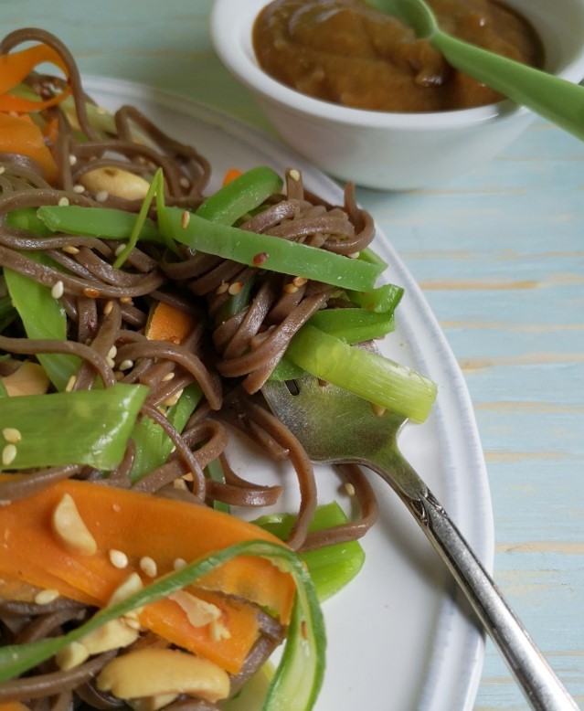 Forkful_of_ribbon_vegetables_and_soba_noodles_served_as_a_salad