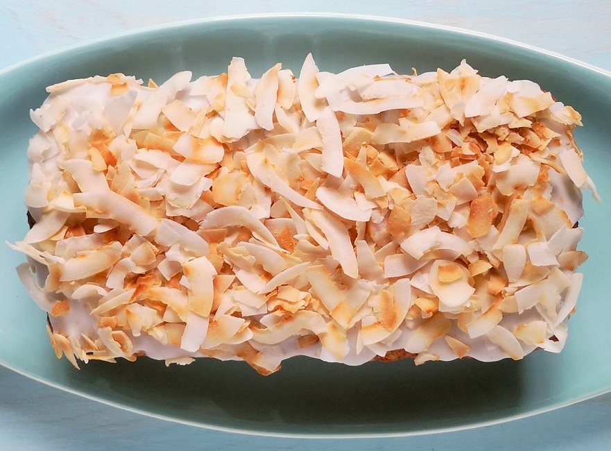 Iced_and_sprinkled_with_toasted_coconut_banana_and_coconut_bread