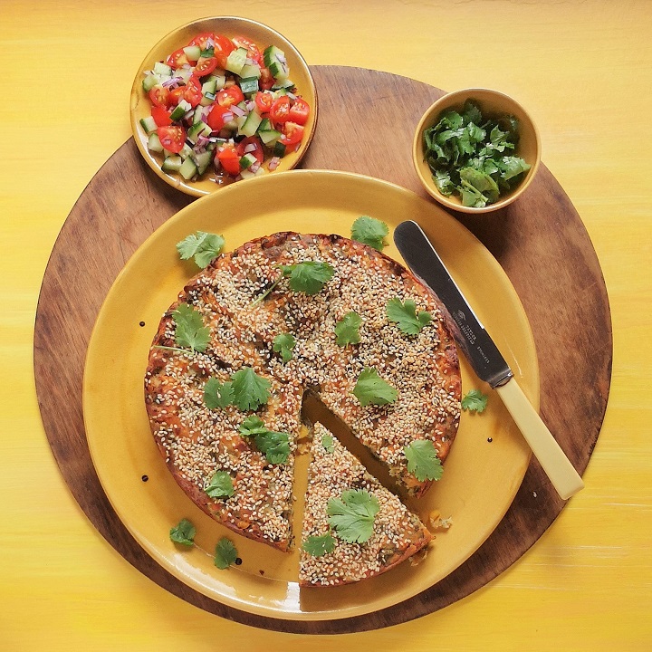 Overhead_image_of_a_homemade_Gujerati-style_spiced_vegetable_cake