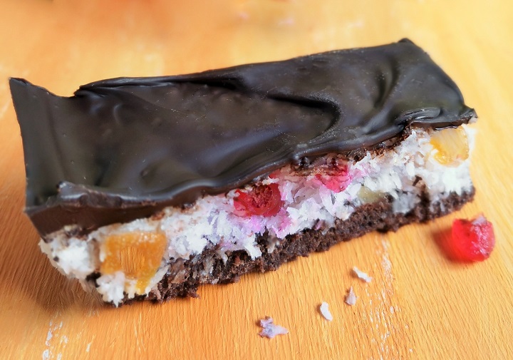 Up_close_on_a_slice_of_tutti_frutti_coconut_cake