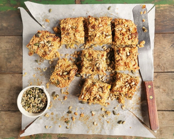 Overhead_image_of_freshly_cut_savoury_flapjack_with_toasted_seeds